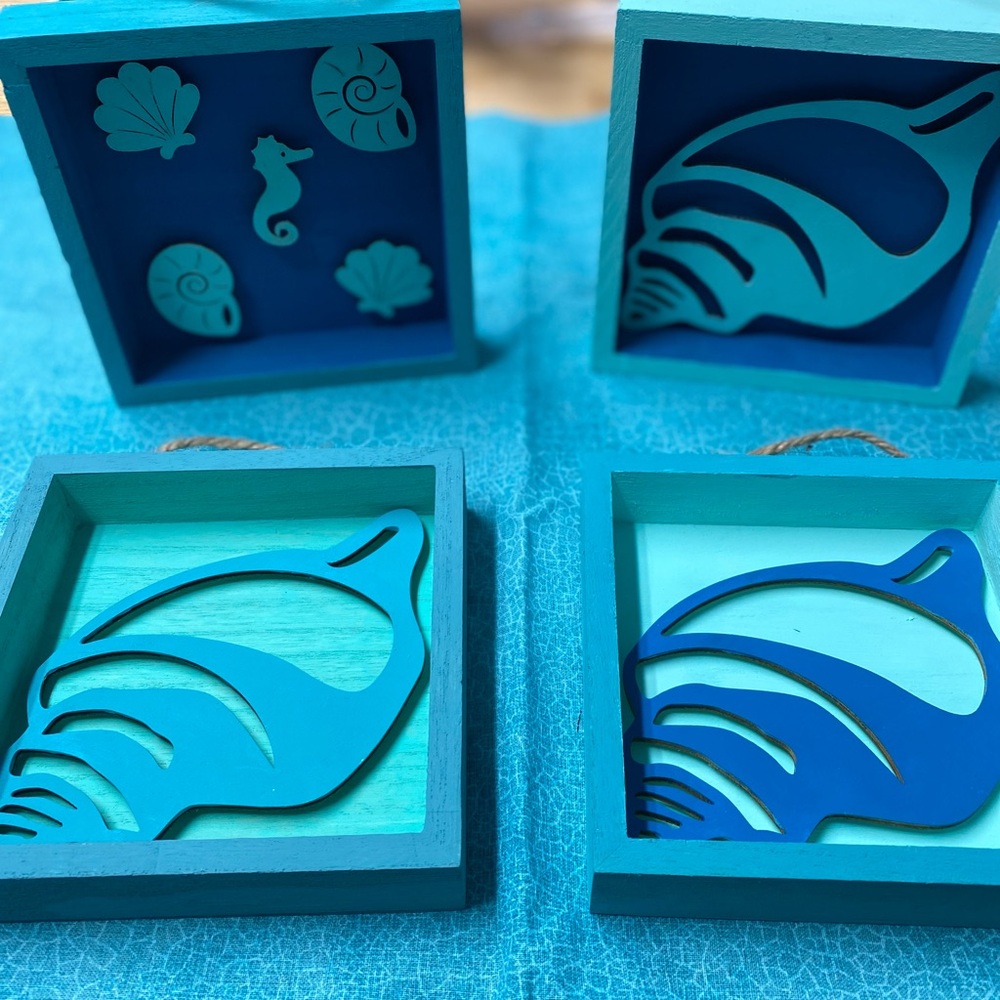 Set of wooden seashell decor